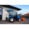 Tractor LS XJ25 MEC con cabina, neumáticos industriales y quitanieves