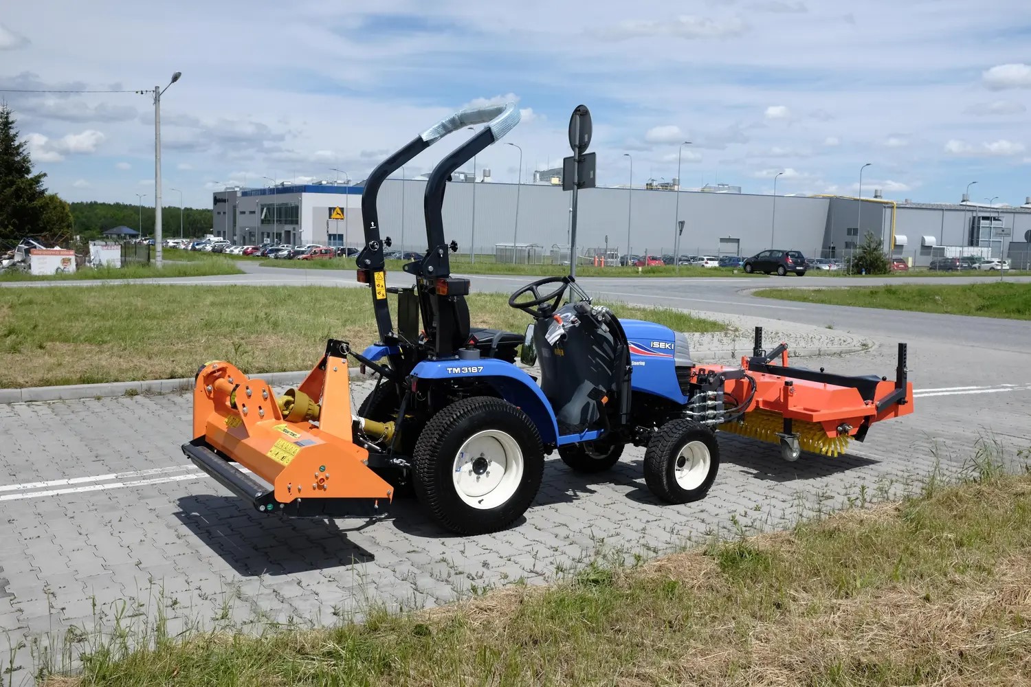 As an authorized ISEKI dealer, we present the Iseki TM3187 with VF 115 flail mower and sweeper