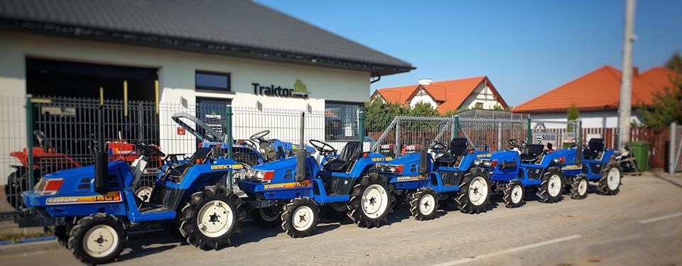 How many HP do the Iseki mini tractors shown in the photo have?