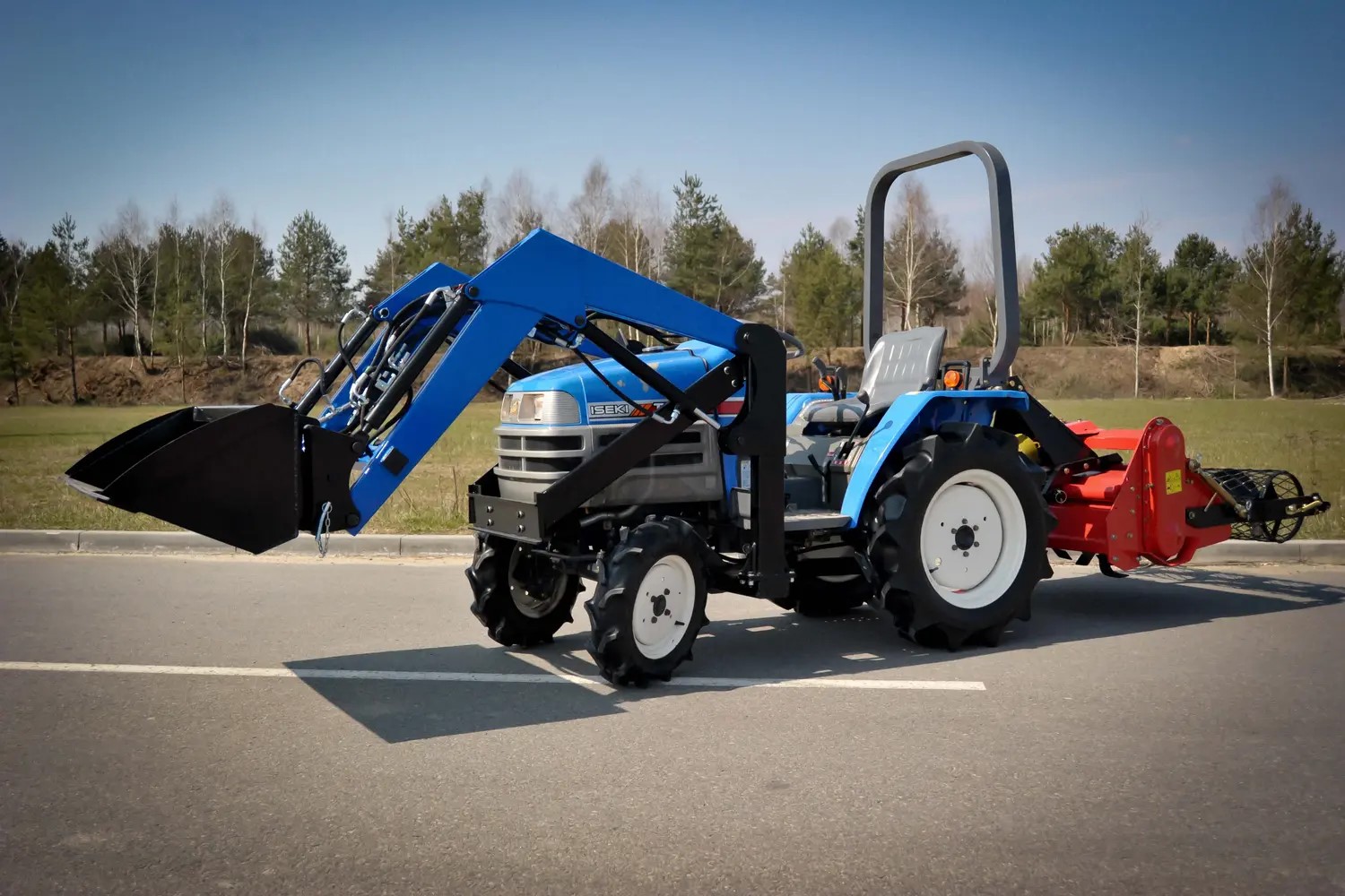 Our next implementation is the Iseki TM17, a TUR front loader and a separation tiller